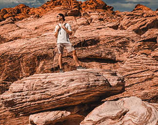 Man Standing On Rocks